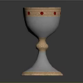 Ornate Silver Goblet With Gold Rim And Red Gemstone Accents