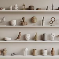 Modern Minimalist Decorative Ornament Set on Shelves with Neutral Tones including Sculptures Vases Animal Figures