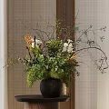 Decorative Black Vase With Green Plants Orange Blooms White Flowers And Twigs On Dark Table