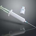 Medical Syringe And Vaccine Vial For Injection Use On Black Surface