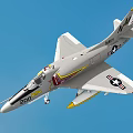 Fighter Jet Marked 200 Silver Gray Body U.S. Flag Emblem Yellow Accents Against Blue Sky