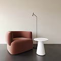 Pink Curved Sofa And White Round Coffee Table With Floor Lamp Light Wall Dark Floor