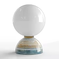 Stylish Modern Table Lamp Featuring White Spherical Lampshade and Colorful Striped Base