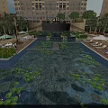 Beautiful Water Fountain In Modern Building Complex With Pool Water Lily Leaves Loungers And Trees