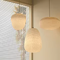 Woven Beige Pendant Lights With Soft Warm Glow In Indoor Living Space