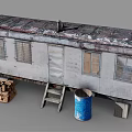 Old Rusty Trailer Exterior With Wooden Logs Ladder And Blue Barrel
