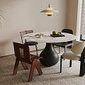 Modern Dining Room With Round Marble Table Chairs Pendant Light And Green Plant