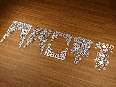 Carved Decorative Pieces With Intricate Ornate Patterns On Wooden Tabletop Surface 3d model