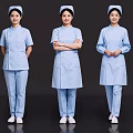 Three Nurses in Blue Medical Uniforms with Nurse Caps Standing in Different Poses