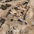 Aerial View Of Scenic Ancient Ruins Landscape With Desert Rock And Vegetation
