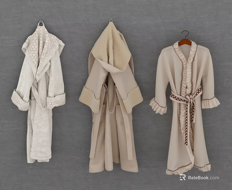 Three Stylish Bathrobes Hanging On Gray Background With Various Designs And Neutral Colors 3d model 