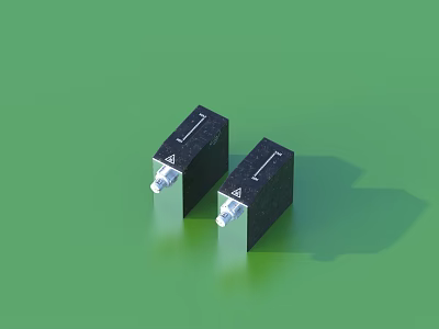Two Black Square Electronic Components With Silver Connectors On Green Background 3d model