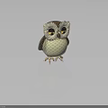 Decorative Owl Figurine With Large Round Eyes And Brown White Textured Feathers