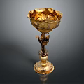 Golden Decorative Goblet with Intricate Floral Patterns on Tall Stem and Ornate Base