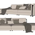Modern Cream Three Seater Sofa With Gray White Round Pillows Dark Blanket And Metal Armrests