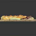 Fresh Braided Bread Served with Ham Walnuts and Cucumber Sticks on Wooden Board