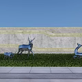 Feature Wall Night View With Stone Texture Yellow Strip Lighting And Deer Sculptures On Grass