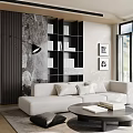 Modern Living Room Interior With Light Sofa Black Bookshelf Marble Wall And Round Coffee Table