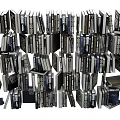 Extensive Collection of Books Magazines Displayed on Shelves and Stacked in Piles