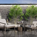Outdoor Chair Table Set With Stone Wall Bamboo Plants And Black Tiled Floor