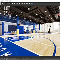 Indoor Basketball Court with Wooden Floor Basketball Hoops Overhead Lighting Net Partitions and Large Windows