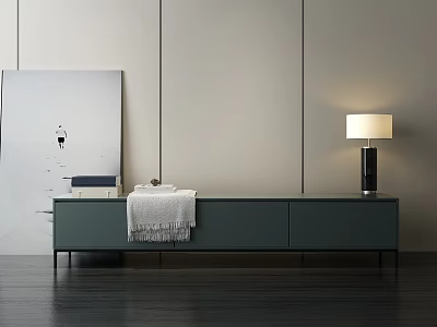 Modern Green TV Stand with Books Blanket Table Lamp and Wall Art on Dark Floor 3d model