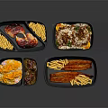 Black Divided Food Containers With Open Lid And Various Foods Including Fries Meat Vegetables