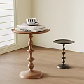 Modern Side Tables With Cylindrical Bases And Round Tops Featuring Books And Mug Near Window