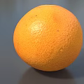 Fresh Ripe Grapefruit With Bright Orange Smooth Textured Skin On Gray Background