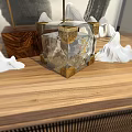 Transparent Glass Cube Decorative Ornament Set With Golden Corner Accents On Wooden Tabletop