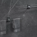 Wall Mounted Modern Towel Racks With Gray Towels On Marble Bathroom Wall