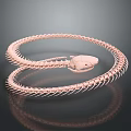 Coiled Rose Gold Snake Skeleton Organ with Dark Background Reflection
