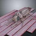 Wooden Insect Model Displayed On Red Wooden Planks With Detailed Texture