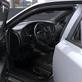 White Modern Sedan Car With Stylish Exterior And Black Wheels