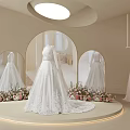 Bridal Shop Display With White Wedding Dresses Arched Mirrors And Floral Decor