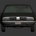 Vintage Black Sedan With Classic Design Front Grille And Headlights
