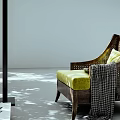 Woven Rattan Lounge Chair with Green Cushion Striped Pillow and Plaid Blanket in Shadowy Light