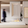 Modern White Fireplace Interior Design With Burning Flames Potted Plant And Decorative Art