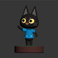 Black Cartoon Cat Figurine Wearing Blue Shirt Standing On Round Green Base With Red Edge