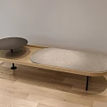 Sleek Modern Coffee Table With Black Metal Wire Frame And Orange Cushioned Top