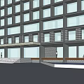 Modern Multi Story Office Building With Large Glass Windows And Flat Roof Design