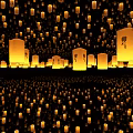 Numerous Sky Lanterns Flying in Night Sky With Chinese Characters And Wishes