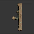 Ornate Bronze Door Handle With Intricate Facial Carvings And Decorative Patterns