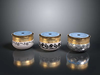 Three Decorative Storage Containers With Gold Lids White Silver Bodies And Intricate Patterns 3d model
