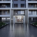 Modern Residential Building Entrance Gate With Glass Doors Paved Walkway And Greenery
