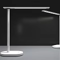 Two White Table Lamps One Tall One Short Against Black Background On Gray Surface
