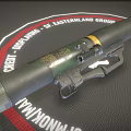 Military Rocket Launcher With Camouflage Pattern Yellow Stripe And Easternland Group Logo