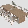 Light Wood Long Dining Table Set with Six Simple White Cushioned Chairs and Potted Plant on Top