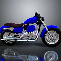 Blue Cruiser Motorcycle With Brown Seat Silver Exhaust Pipes And Silver Wheels