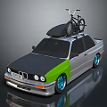 Gray And Green Sedan With Bicycle On Roof And Stylish Blue Wheels